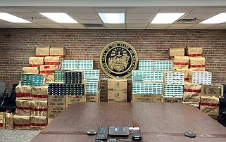 FILE - This Oct. 13, 2023 photo shows dozens of boxes containing illegal, untaxed boxes of cigarettes that were seized on Oct. 12 by the Arkansas State Police and Arkansas Tobacco Control. (Special to the Democrat-Gazette/DFA)